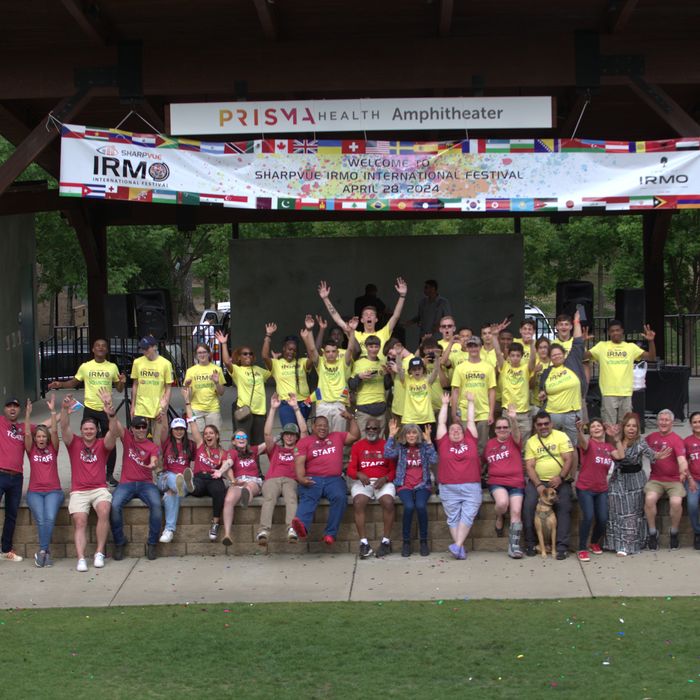 Festival volunteers cheering on the amphitheater stage